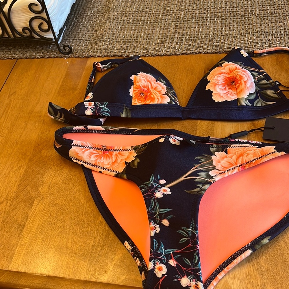 Triangle bathing suit with tags never worn